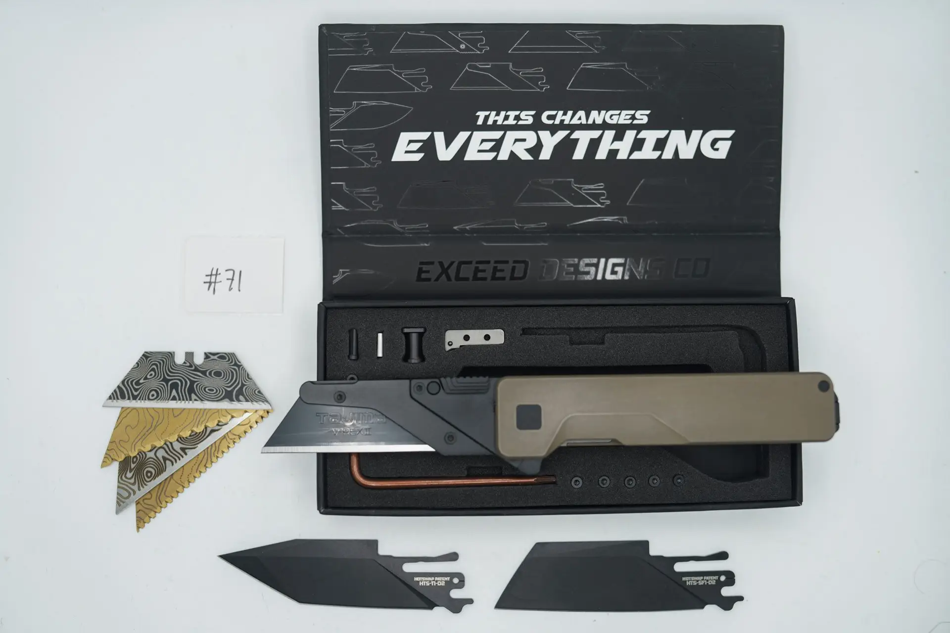 BUILD #71 — Condition 8/10 — TiRant ULTRA Smooth Centurion Bronze W/Black Hardware Contrast (Small scratch near clip only, See Pic) + Original Box W/Spare Jet-Black PVD Hardware Kit / Lock Bar insert + D2 Jet-Black Sheepsfoot Hotswap Blade + D2 Jet-Black Tanto Hotswap Blade + 4X Custom Laser Engraved Razor Blades