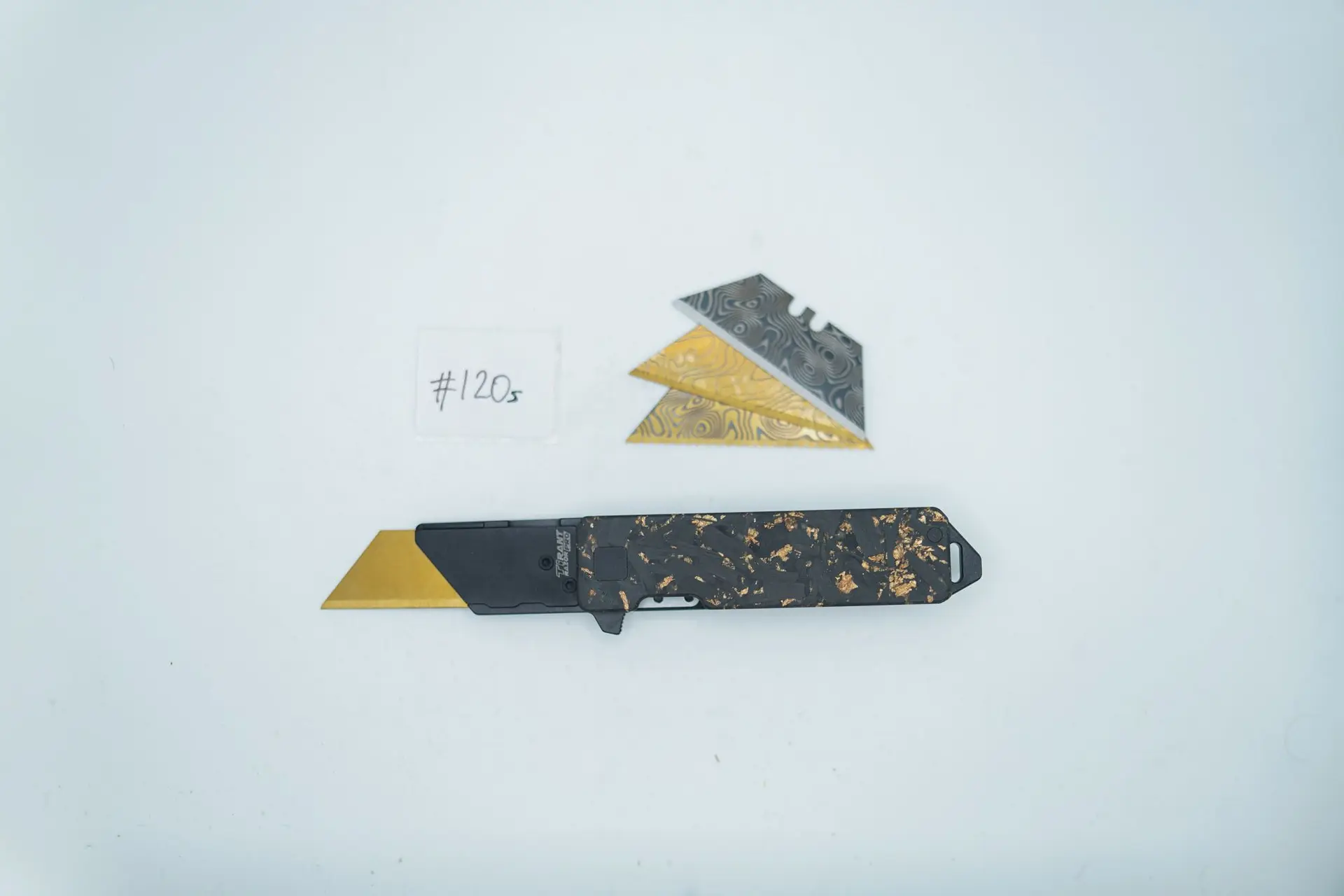 BUILD #120s — Condition 10/10 — TiRant RAZOR V3 + Grade-A Hand Picked Gold-Flake Photo Sample Chosen + Installed Skiff Bearings + Pry Bar Rear Spacer Installed + 3X Custom Laser Engraved Razor Blades From The ToolRoom