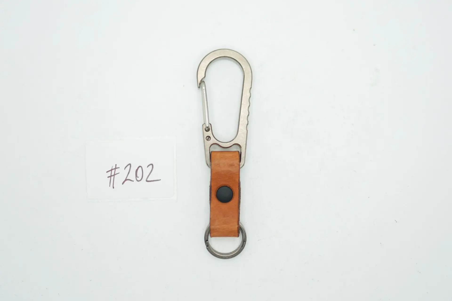 BUILD #202 Condition 10/10 — V1 Titanium Carabiner W/Ti Key Ring – Light Stonewash Ti + Natural Tan Leather + Matte Black Rivet