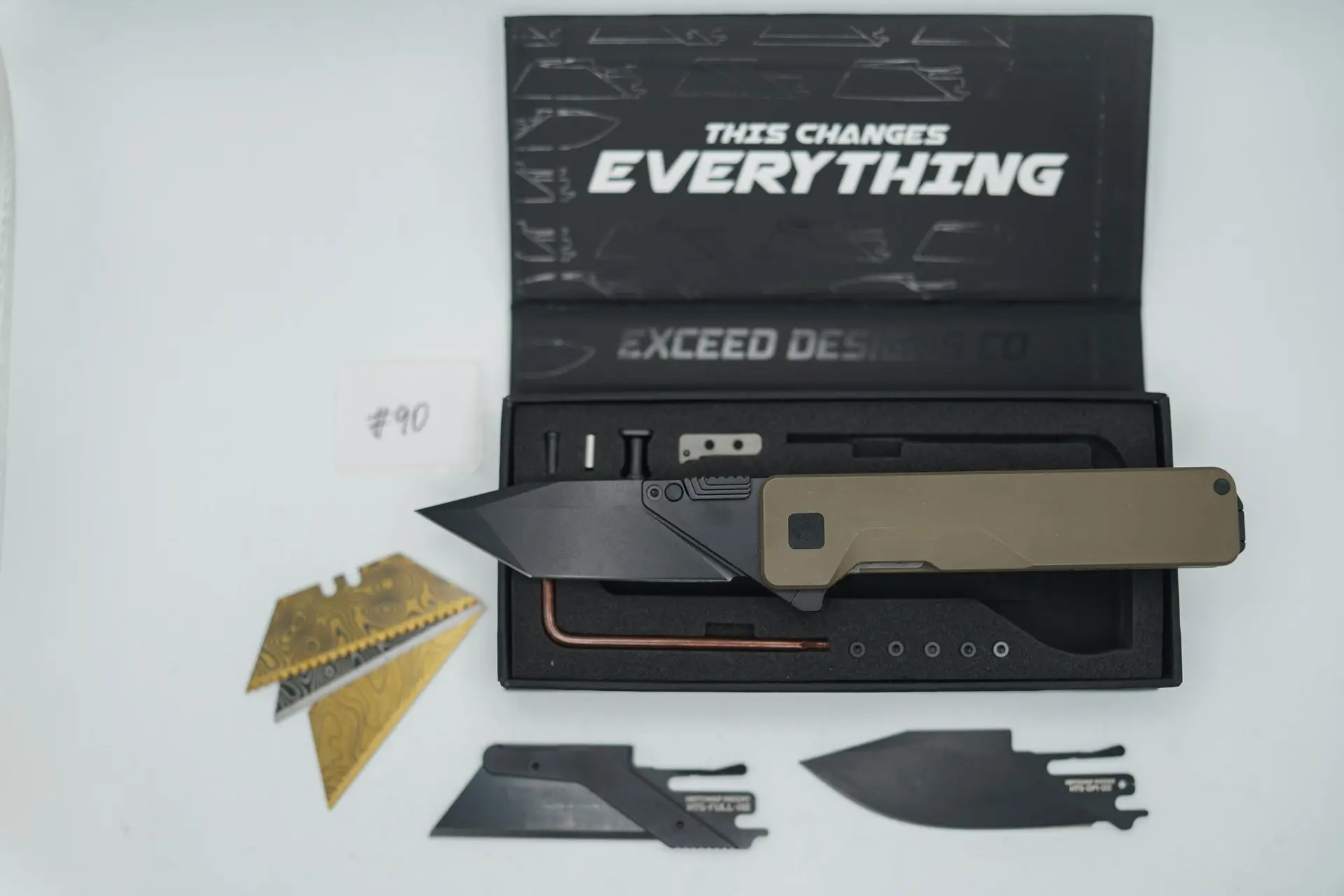 BUILD #90 — Condition 9/10 — TiRant ULTRA Smooth Centurion Bronze + W/Jet-Black PVD Contrast Hardware + Original Box W/Jet-Black Hardware Kit / Lock Bar insert + D2 Jet-Black Drop Point Hotswap Blade + D2 Jet-Black Tanto Hotswap Blade + 3X Custom Laser Engraved Razor Blades