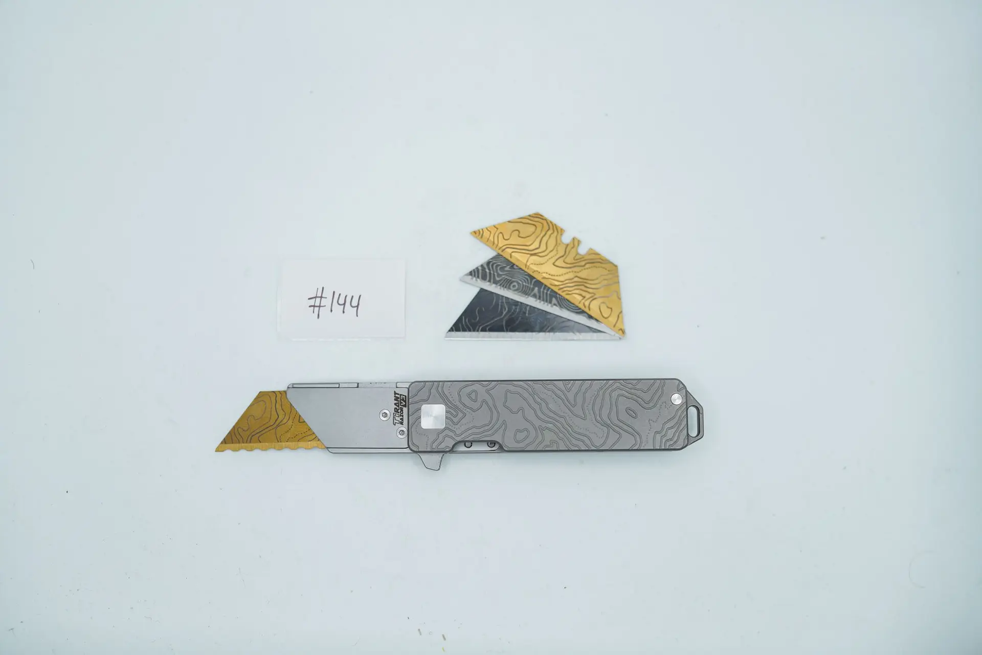BUILD #144 — Condition 10/10 — TiRant RAZOR V3 Cascadia TOPO 3D-Milled Both Sides Stonewashed Finish + 3X Custom Laser Engraved Razor Blades From The ToolRoom