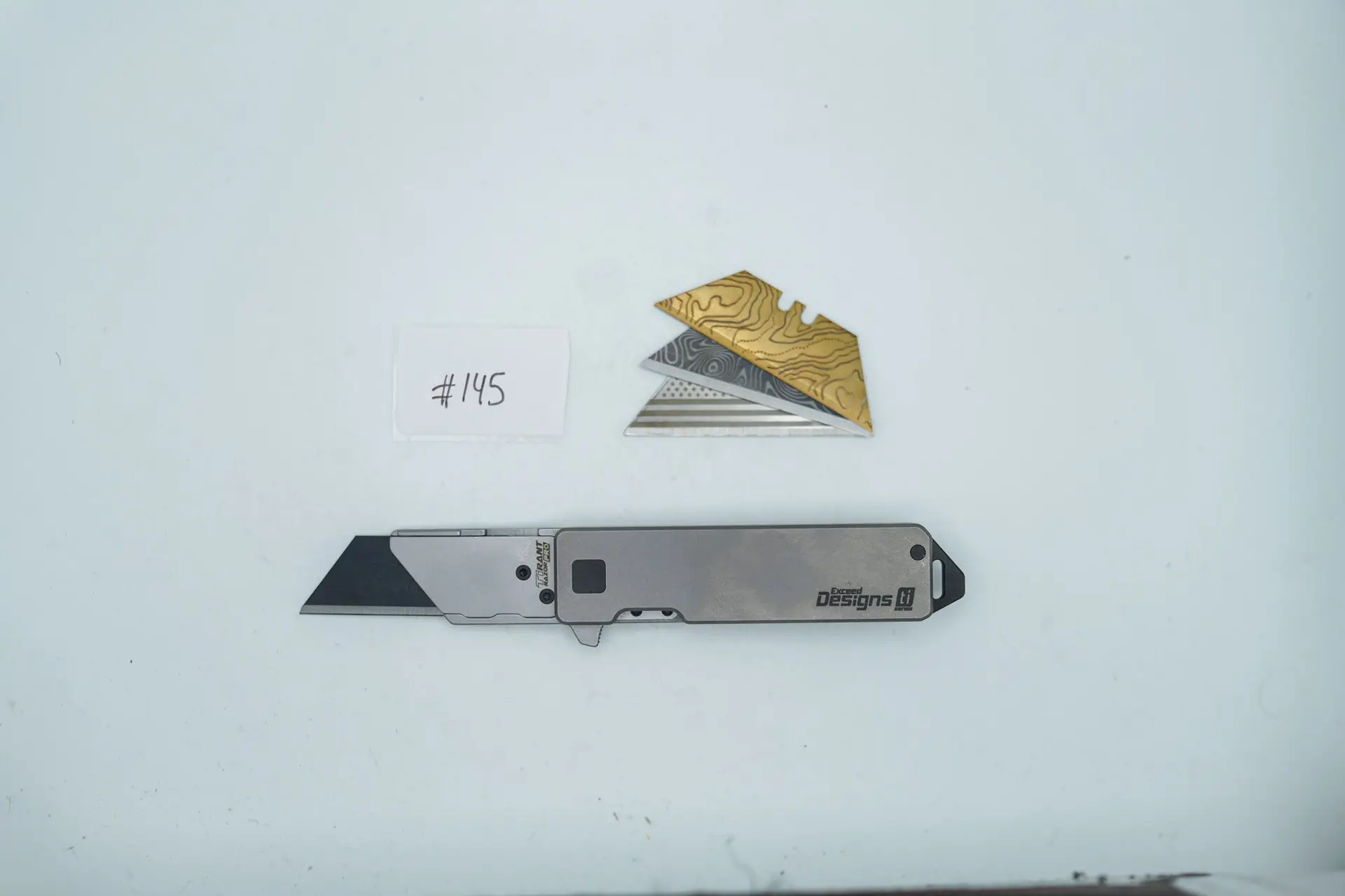BUILD #145 — Condition 10/10 — TiRant RAZOR V3 Smooth Stonewashed Finish + Jet-Black Hardware Kit + Jet-Black Pry Bar + 38MM Mini Clip + 3X Custom Laser Engraved Razor Blades From The ToolRoom