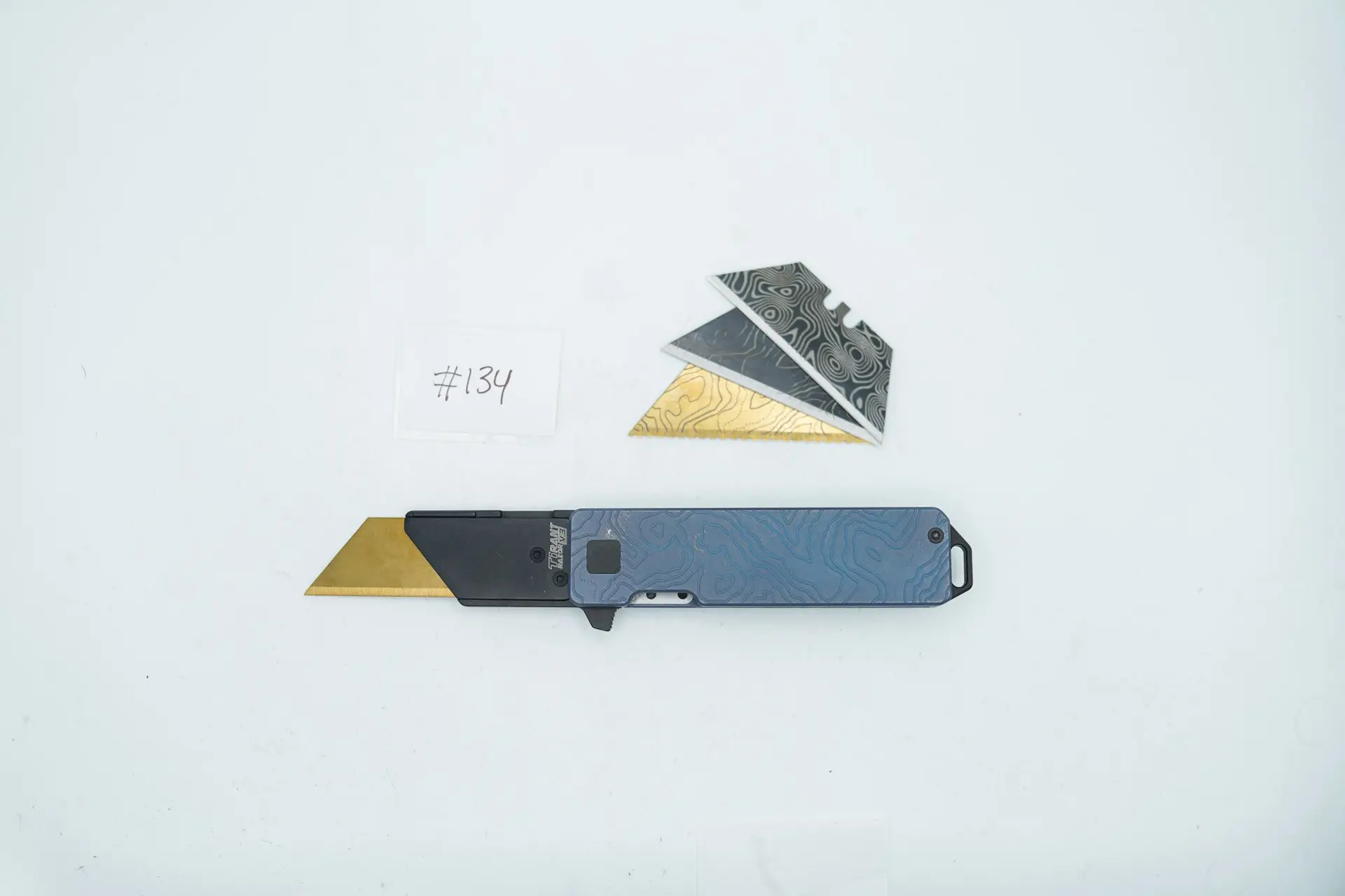 BUILD #134 — Condition 9/10 — TiRant RAZOR V3 Cascadia TOPO 3D-Milled Both Sides + Custom Blue ANO + 3X Custom Laser Engraved Razor Blades From The ToolRoom