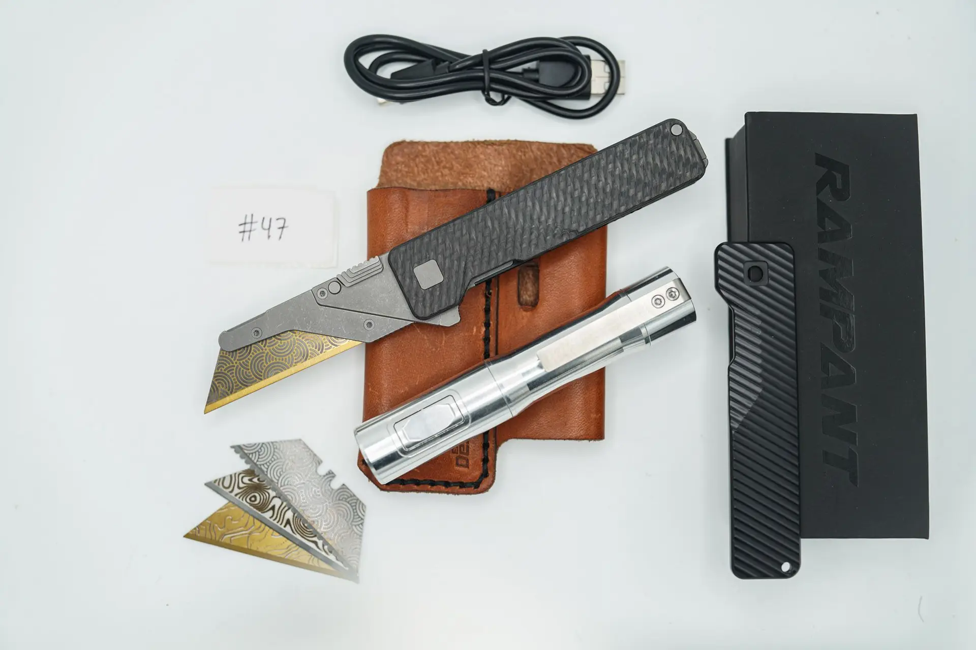 BUILD #47 Combo — Condition 9/10 — TiRant ULTRA Carbon Fiber USA-Milled Deep Slash RH Scale + Jet-Black PVD Deep Slash LH Scale + Original Deep Slash RH Ti Black PVD Scale + 4X Custom Laser Engraved Razor Blades + Rampant R4 519a Aluminum Flashlight In RAW Machined Finish + 9/10 Prototype Brown FieldPro Pocket Organizer W/Belt Loop