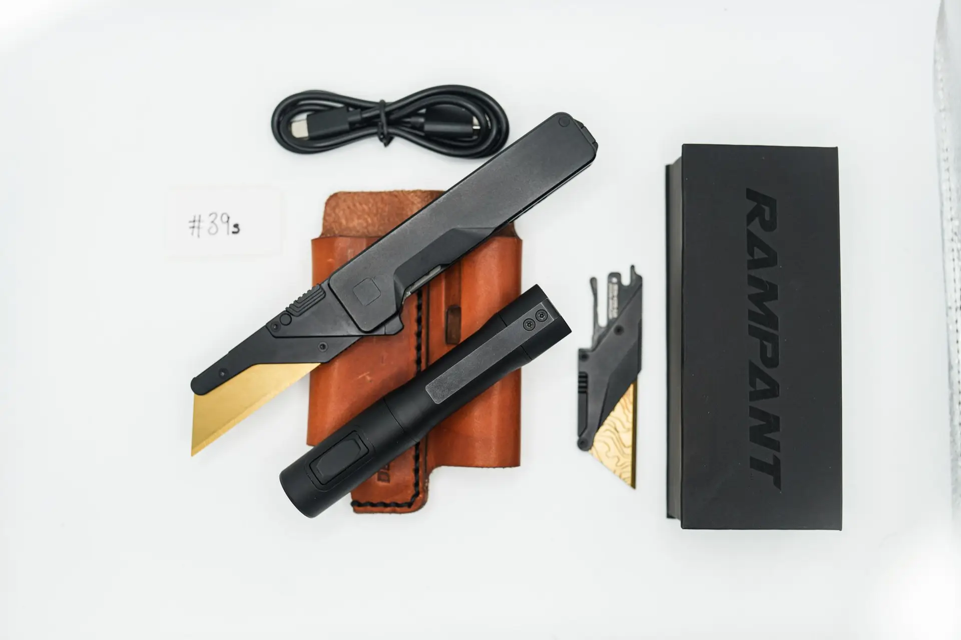 BUILD #39s Combo — Condition 9/10 — TiRant ULTRA Jet-Black PVD + Installed SKIFF Bearings + V2 Black Quick Release Insert + Jet-Black ANO Rampant R4 Aluminum + Tan Natural Leather FieldPro Pocket Organizer
