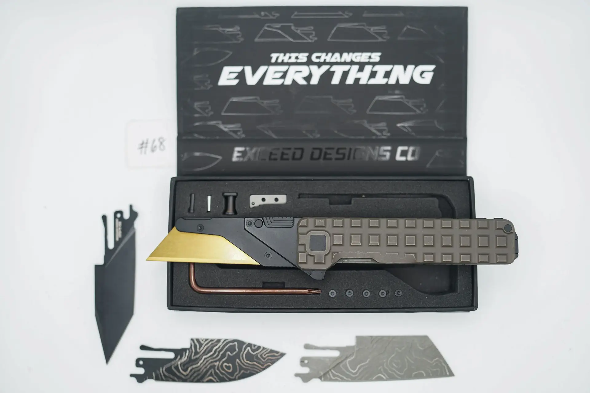 BUILD #68 — Condition 9/10 — TiRant ULTRA FULL FRAG Edition (Centurion Bronze ANO) W/Frag Milled Backspacer Pre-Installed + Original Box W/Spare Jet-Black PVD Hardware Kit / Lock Bar insert + D2 Jet-Black Tanto Hotswap Blade + Blem Topo-engraved Jet-Black D2 Drop Point Blade + Blem Sheepsfoot Topo Laser Engraved D2 blade