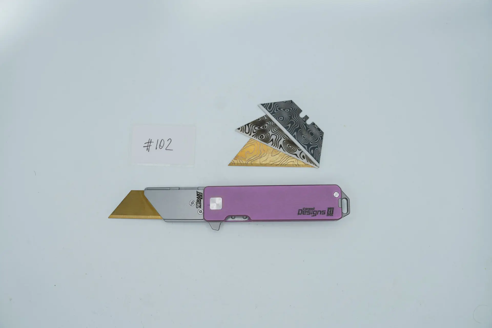 BUILD #102 — Condition 8/10 — TiRant RAZOR V3 + RARE Hand-Applied Custom Pink With Light Purple Toning Anodization + 3 Custom Laser Engraved Razor Blades From The ToolRoom