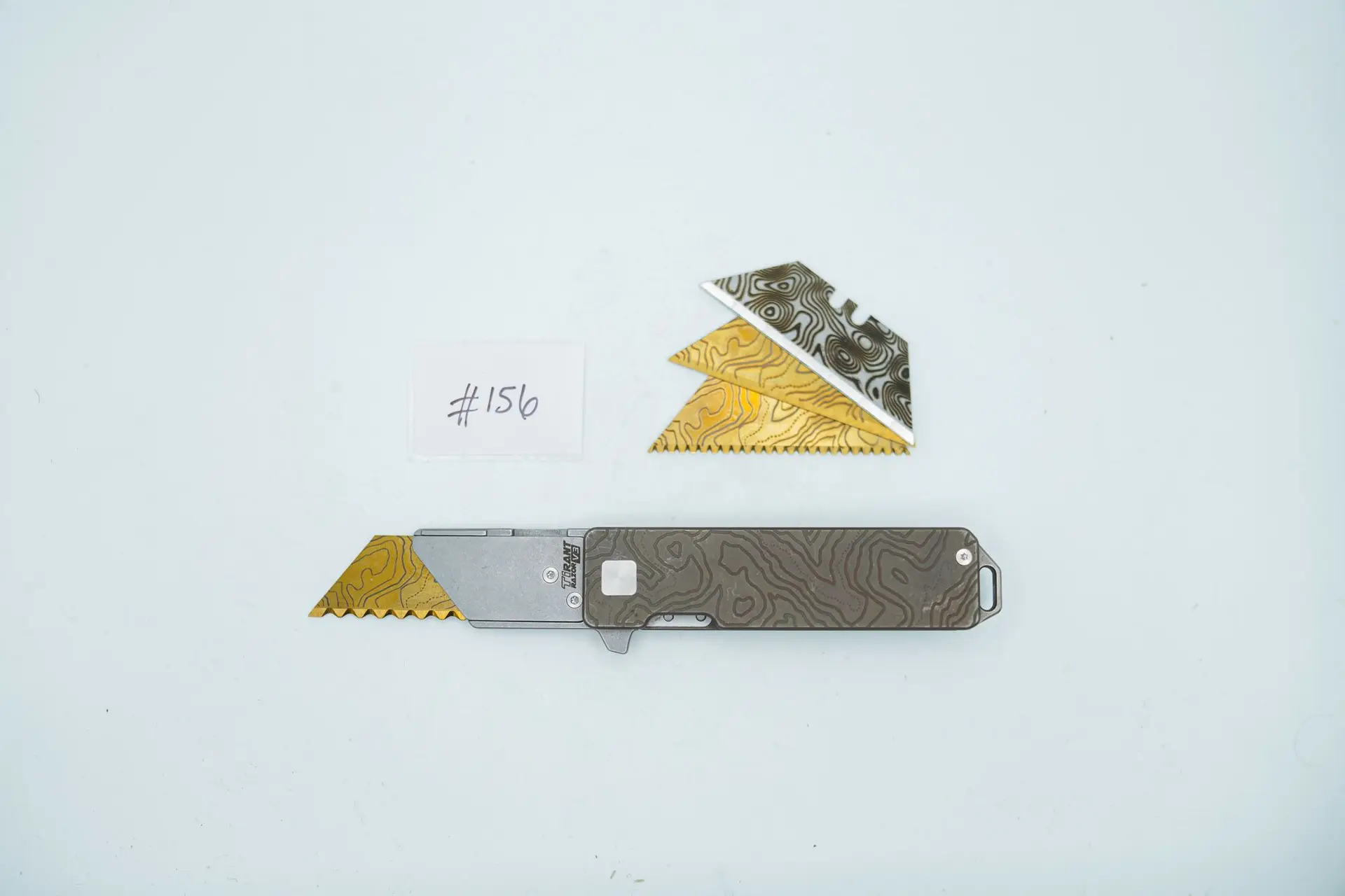 BUILD #156 — Condition 8/10 — TiRant RAZOR V3 Cascadia TOPO 3D-Milled Both Sides + Custom Centurion Bronze ANO + 3X Custom Laser Engraved Razor Blades From The ToolRoom